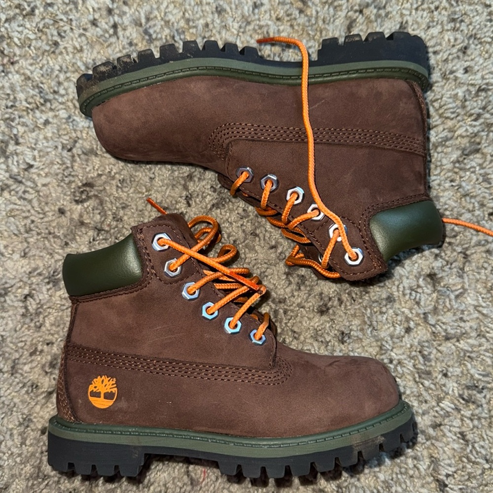 Used in great condition Timberland Kids Brown Boots with Orange Laces